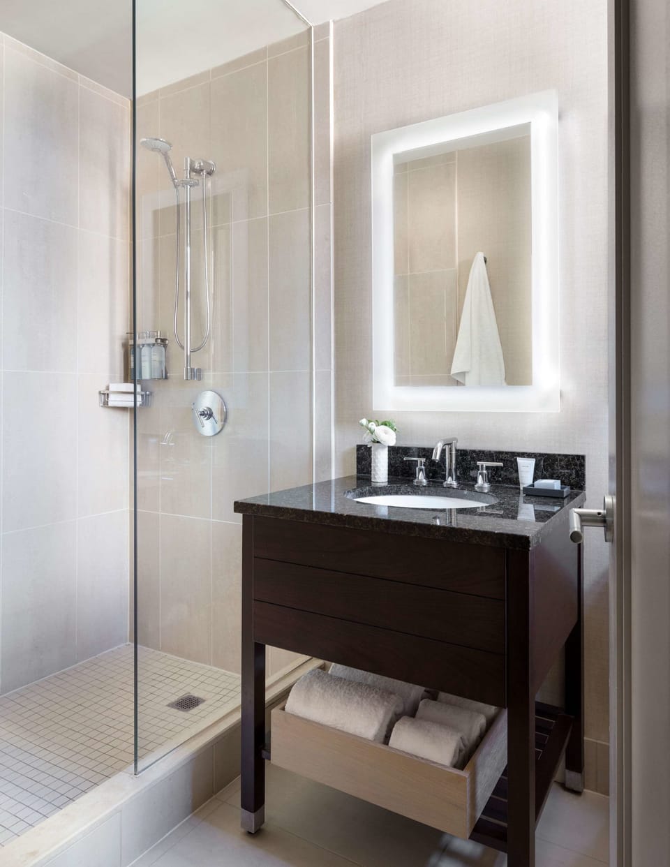 Shower, eco-friendly toiletries, towels