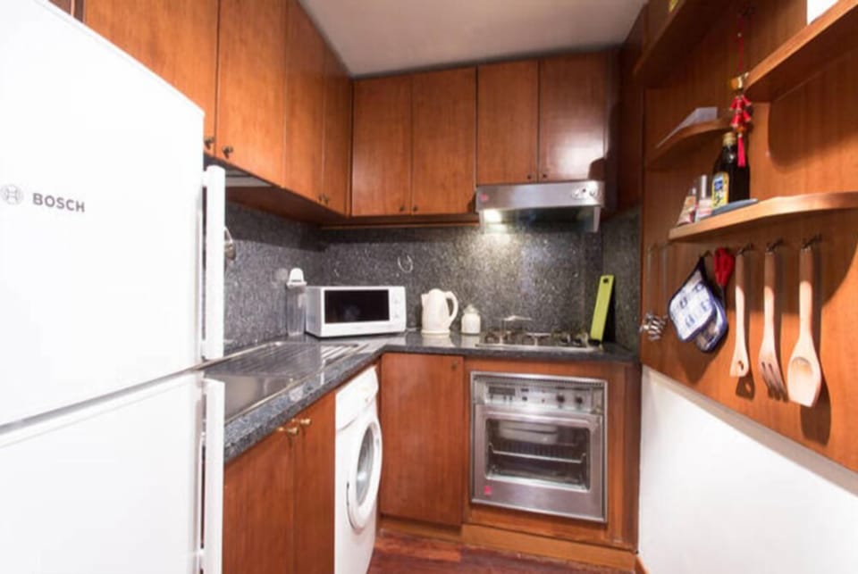 Apartment, 1 Bedroom, Balcony | Private kitchen | Full-size fridge, microwave, oven, coffee/tea maker