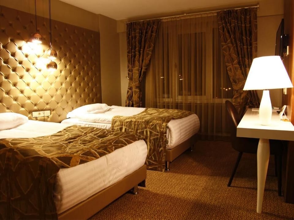 Standard Double or Twin Room, Non Smoking | Minibar, desk, free WiFi, bed sheets