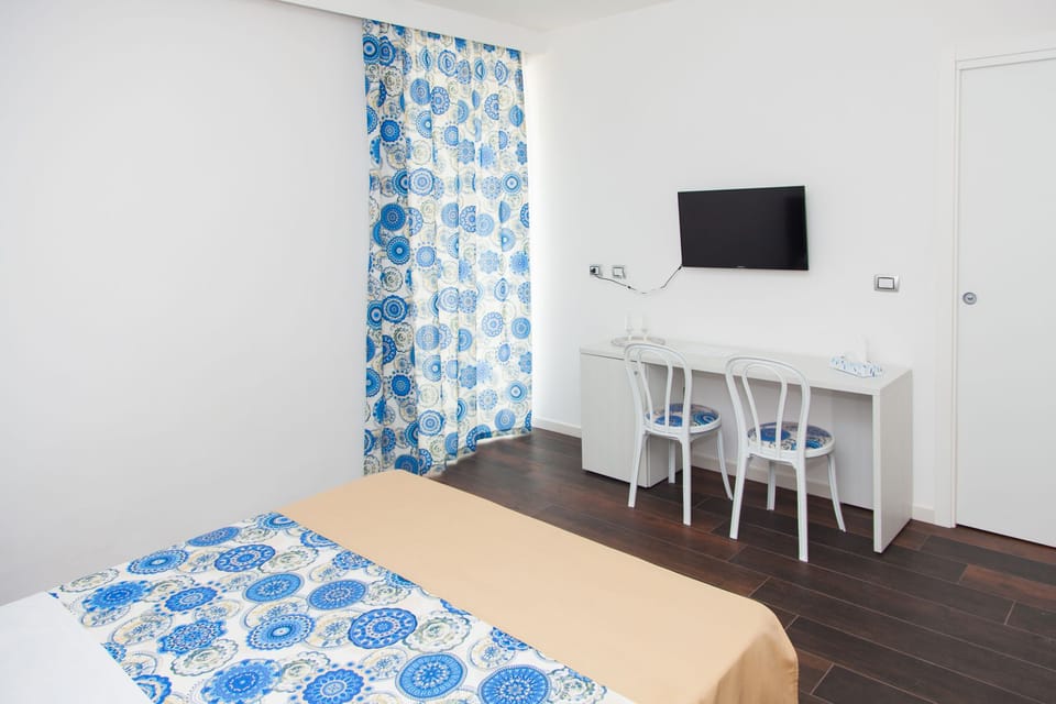 Double Room, Sea View (Positano) | Down comforters, in-room safe, desk, blackout drapes