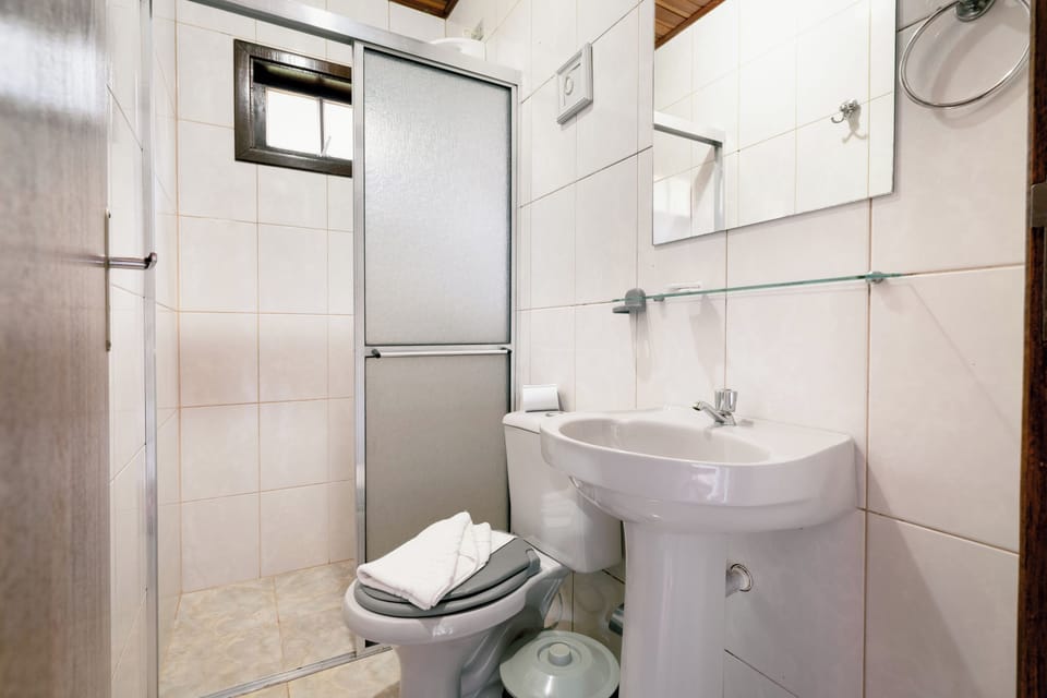 Junior Room | Bathroom | Designer toiletries, slippers, towels, soap