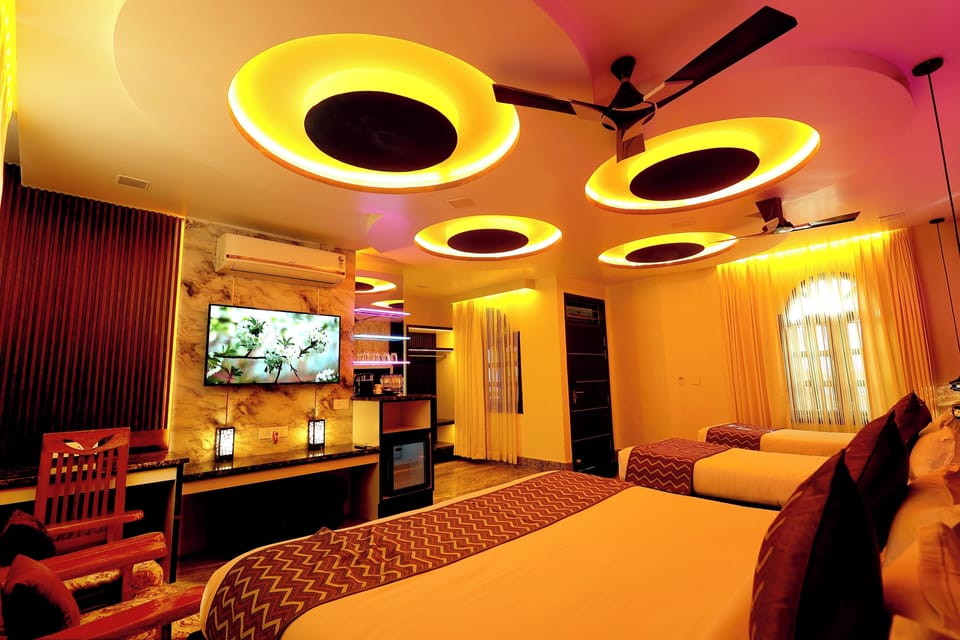 Luxury Quadruple Room | Hypo-allergenic bedding available, memory foam beds, in-room safe, desk