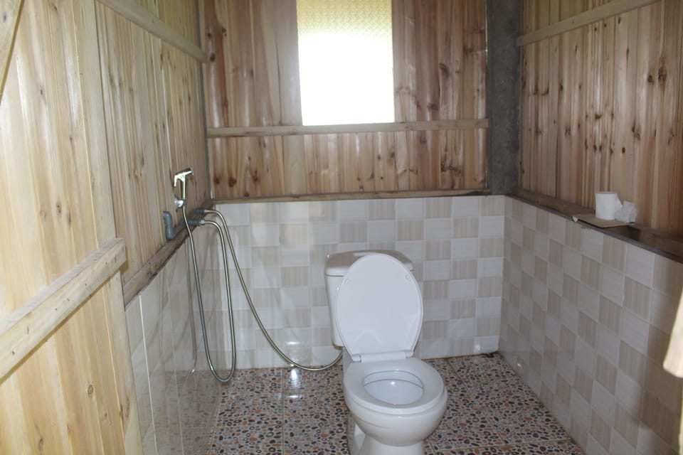 Bed in 16-Bed Mixed Dormitory (Mattresses Only) | Bathroom | Shower, free toiletries, slippers