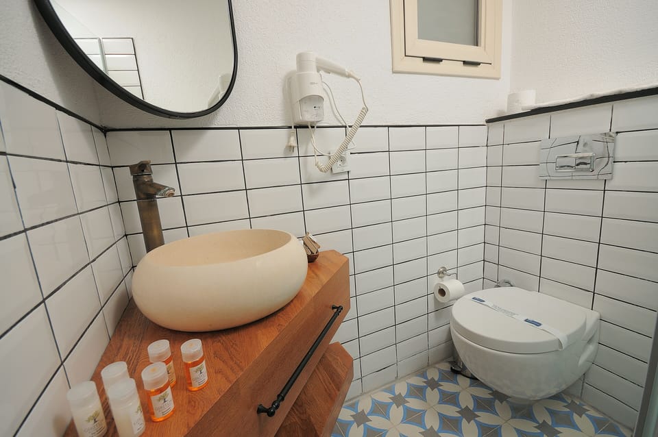 Free minibar items, in-room safe, desk, laptop workspace
