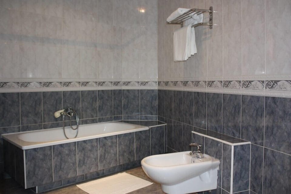 Deep soaking tub, free toiletries, hair dryer, bidet