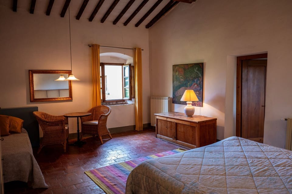 Triple Room, Non Smoking, Courtyard View | Down comforters, desk, rollaway beds, bed sheets