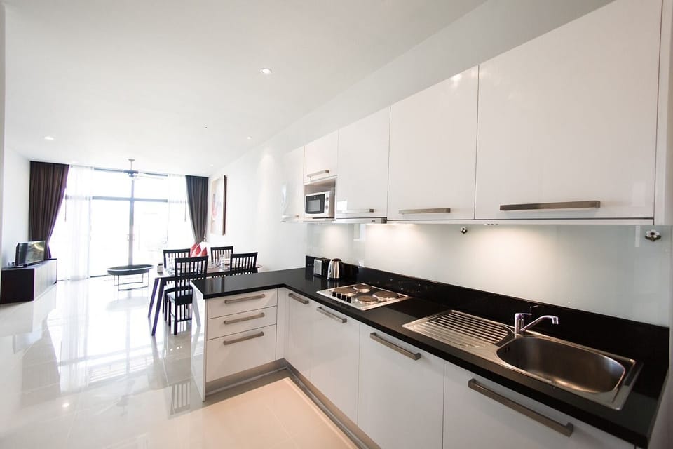 Villa | Private kitchen | Coffee/tea maker, full-size fridge, microwave, stovetop