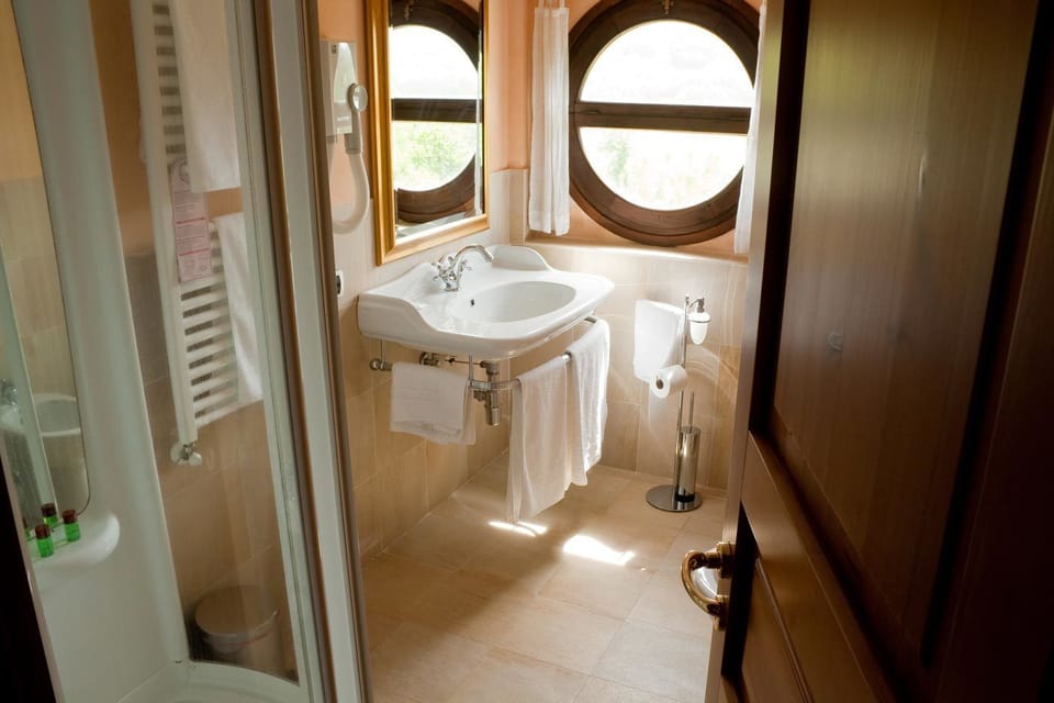 Double or Twin Room | Bathroom | Shower, free toiletries, hair dryer, bathrobes