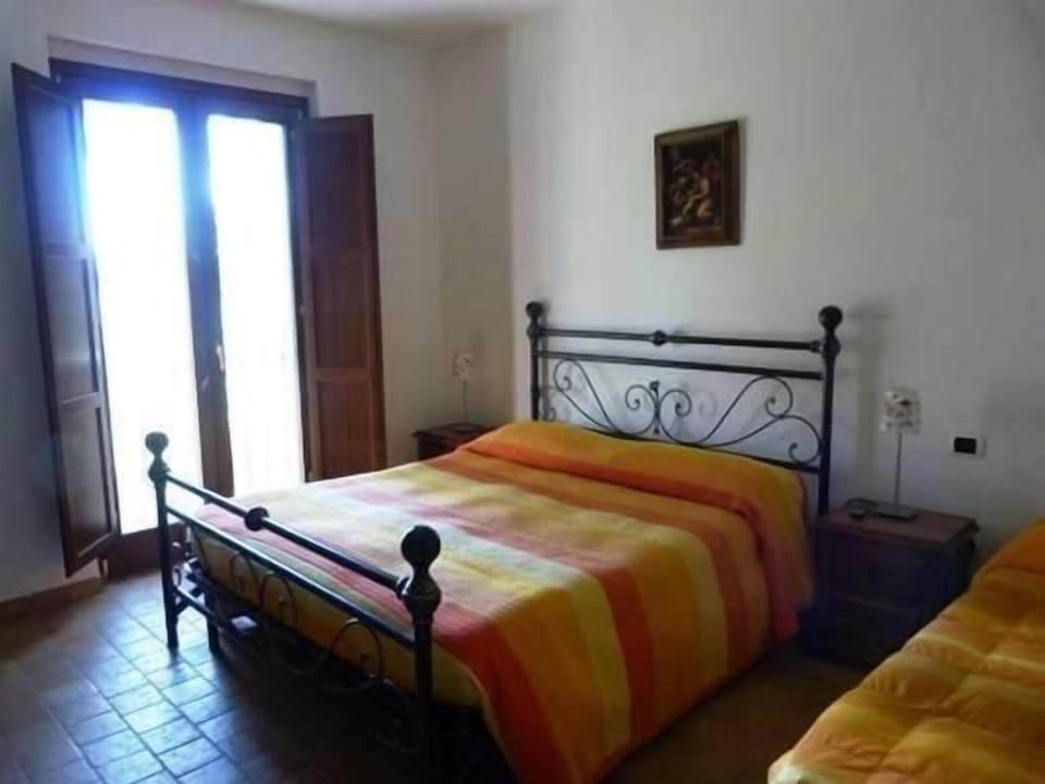 Minibar, desk, bed sheets