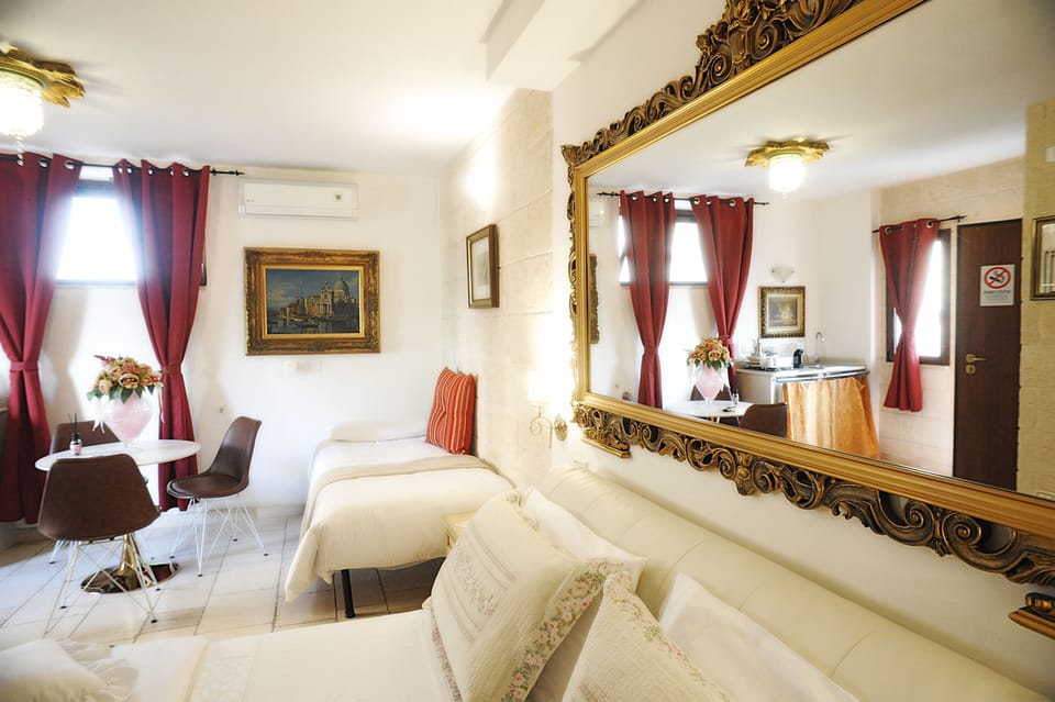 Superior Suite, Multiple Beds, Non Smoking, Ground Floor | Desk, soundproofing, free WiFi, bed sheets