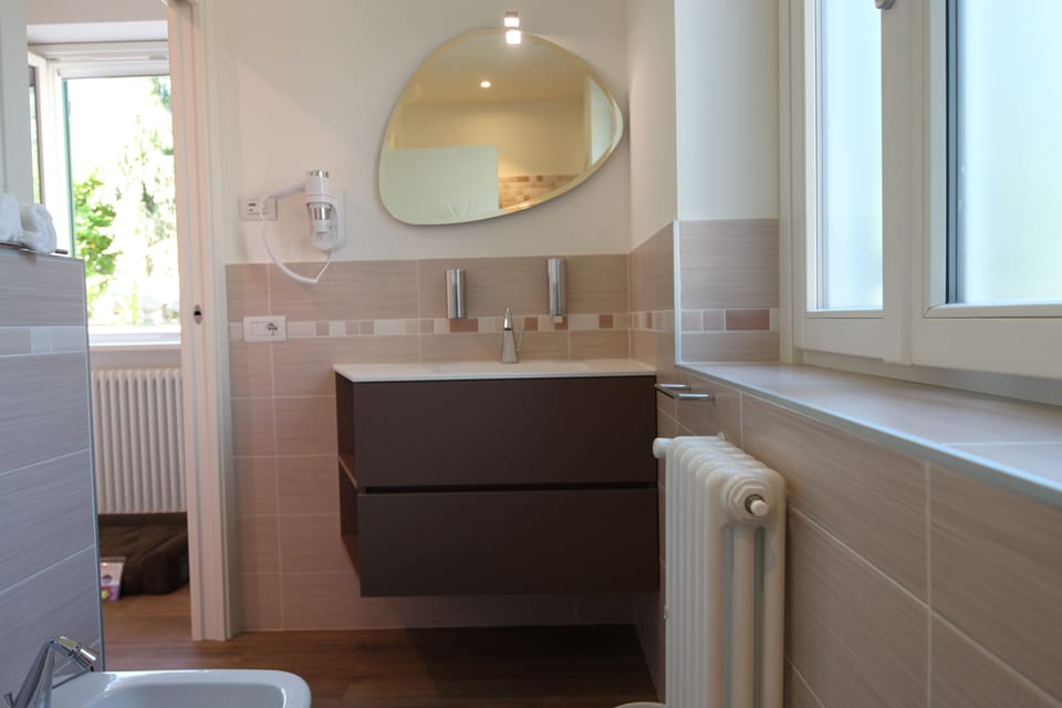 Panoramic Double Room, 1 Queen Bed, Non Smoking | Bathroom | Shower, rainfall showerhead, hair dryer, bathrobes