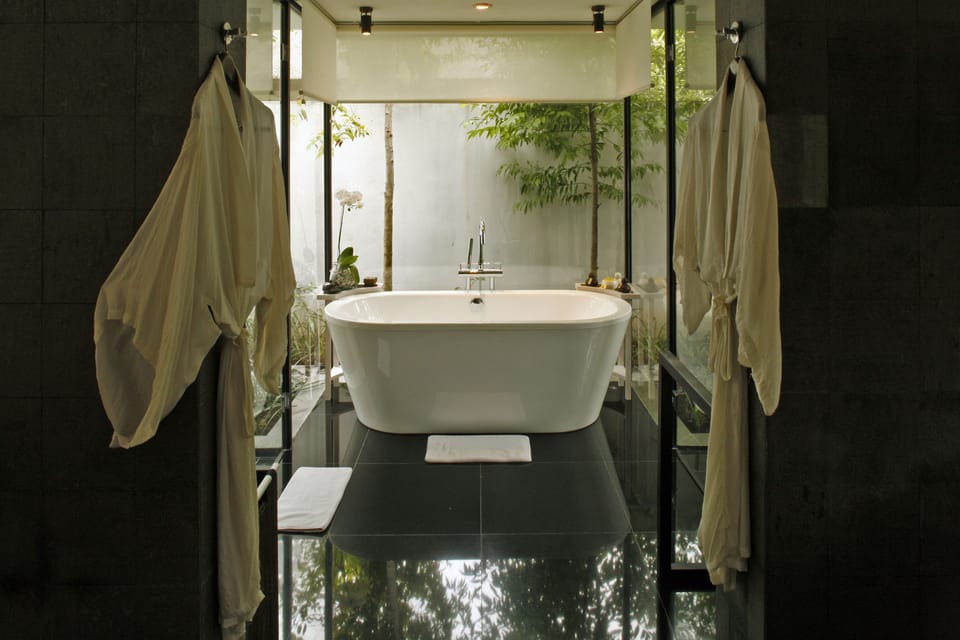One-Bedroom Luxury Pool Villa with Free Airport Transfer | Bathroom | Separate tub and shower, rainfall showerhead, eco-friendly toiletries