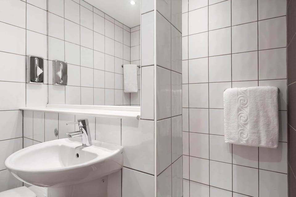Eco-friendly toiletries, hair dryer, towels, shampoo