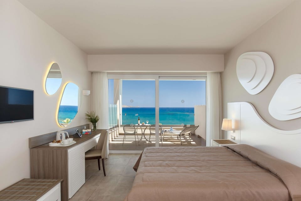 Family Room, Balcony, Sea View (Executive) | Free minibar, in-room safe, desk, blackout drapes