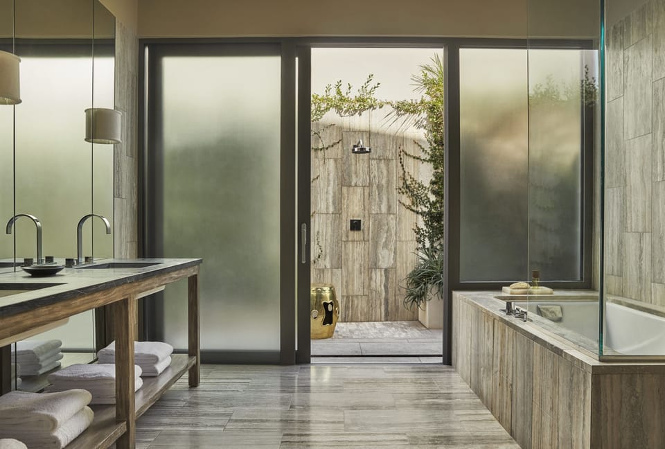 Separate tub and shower, deep soaking tub, designer toiletries
