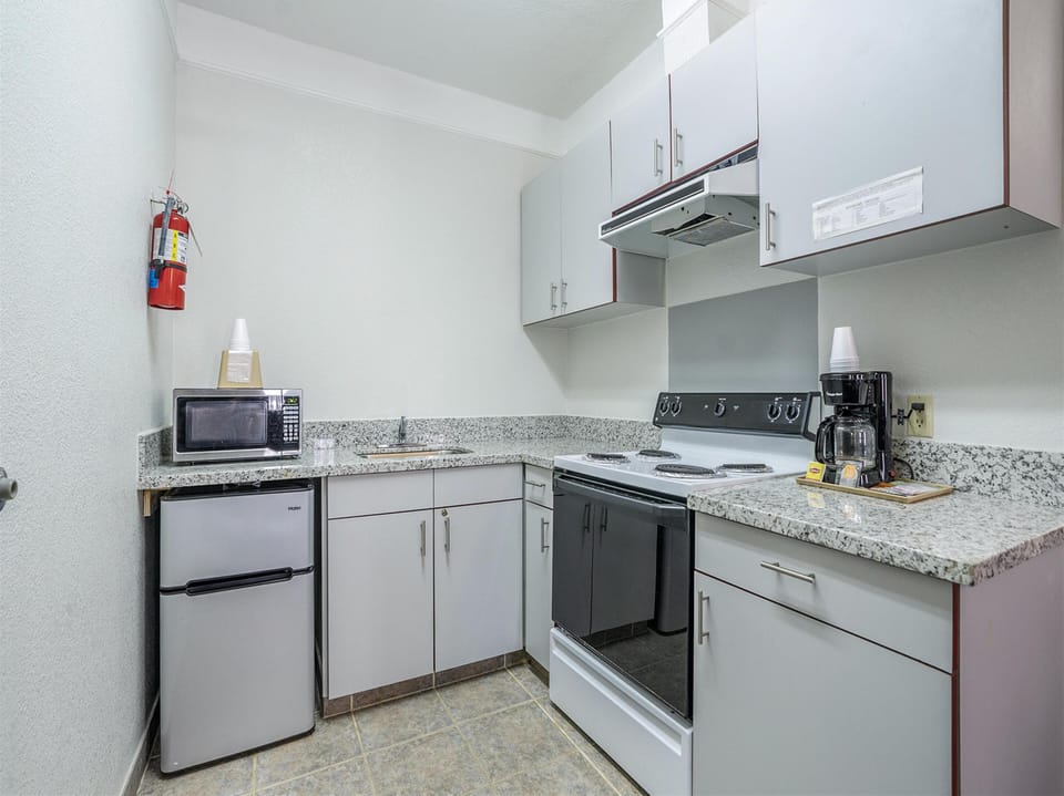 Studio Suite, 1 King Bed, Non Smoking (Second Floor, Interior Stairs Only) | Premium bedding, blackout drapes, iron/ironing board, free WiFi