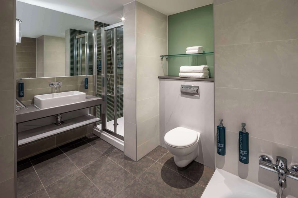 Suite, 1 King Bed (Master) | Bathroom | Designer toiletries, hair dryer, towels
