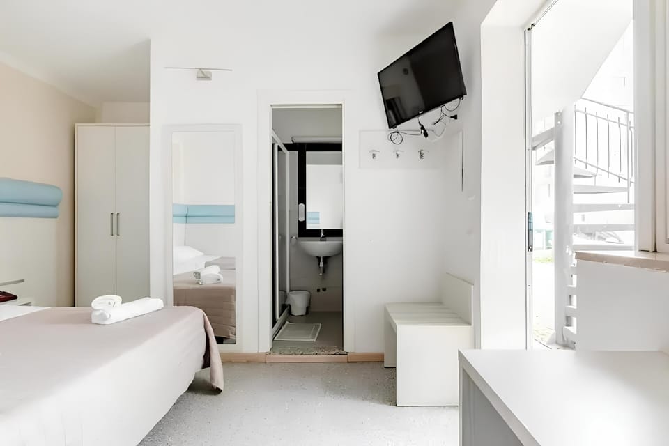 Family Room, 1 Bedroom | Premium bedding, down comforters, in-room safe, desk