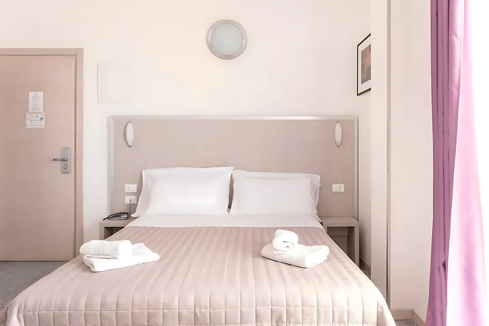 Premium bedding, down comforters, in-room safe, desk