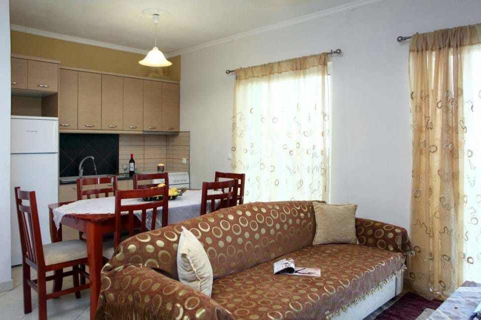 Apartment, 2 Bedrooms | Living room | Flat-screen TV