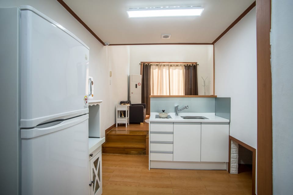 Junior Suite, 1 Double Bed | Private kitchenette | Full-size fridge, microwave, electric kettle, rice cooker