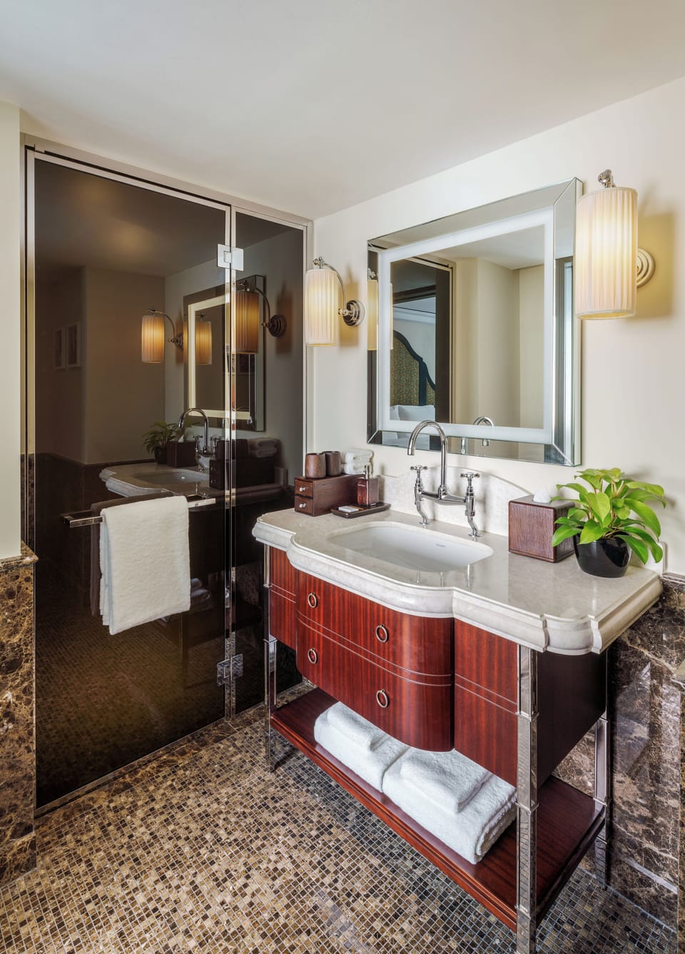 Shower, designer toiletries, hair dryer, bathrobes