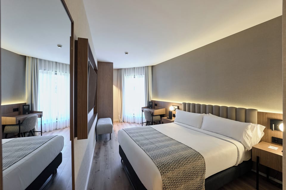 Premium bedding, down comforters, minibar, in-room safe