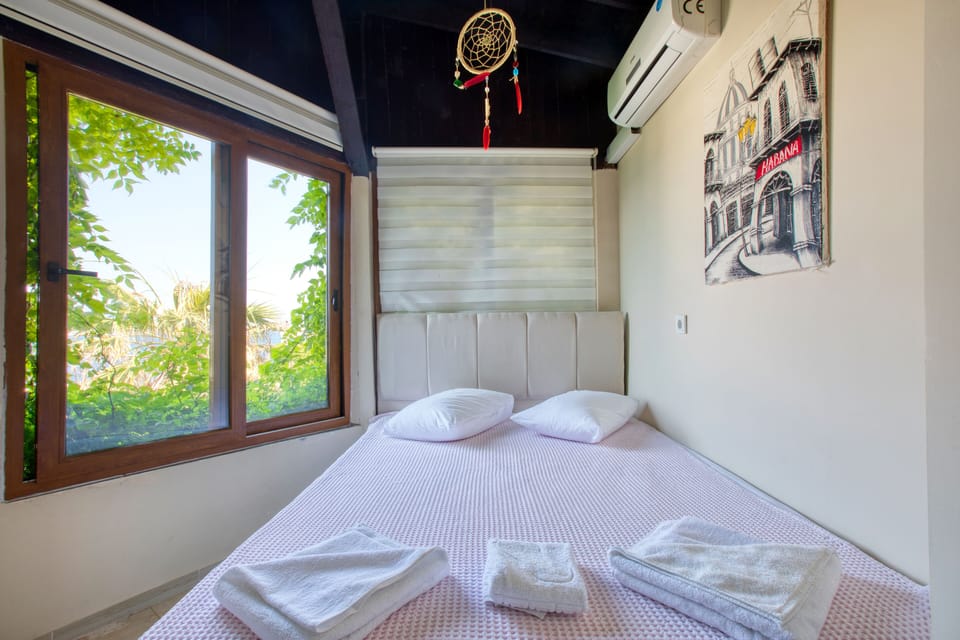 Standard Double Room, 1 Queen Bed, Partial Sea View | Premium bedding, individually decorated, blackout drapes, soundproofing