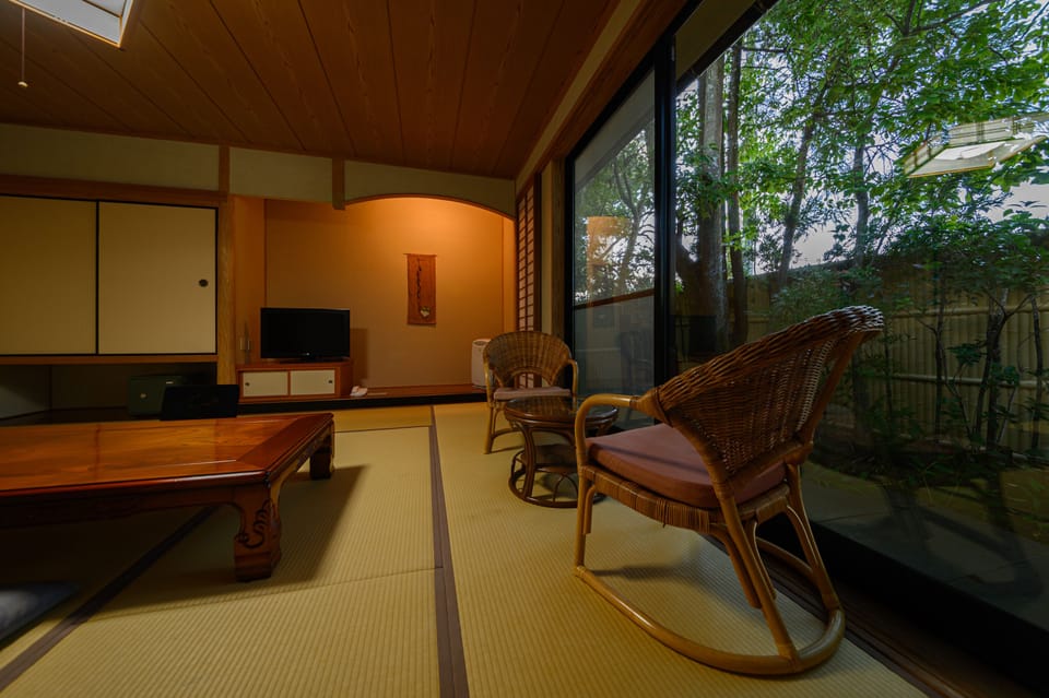 Japanese Style with Bath Made of Rocks, Non Smoking | In-room safe, individually decorated, individually furnished, bed sheets