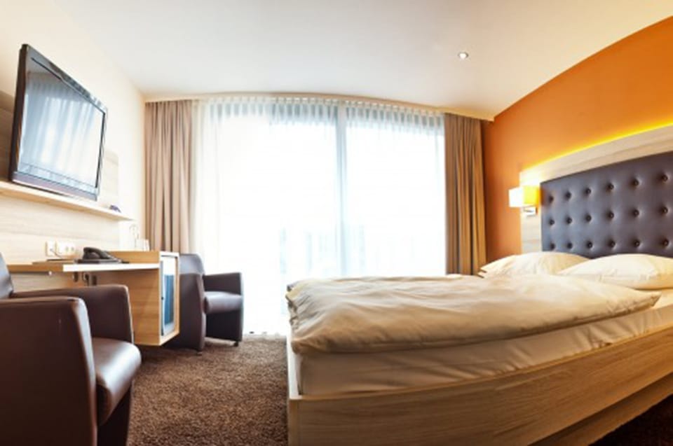 Minibar, desk, blackout drapes, soundproofing