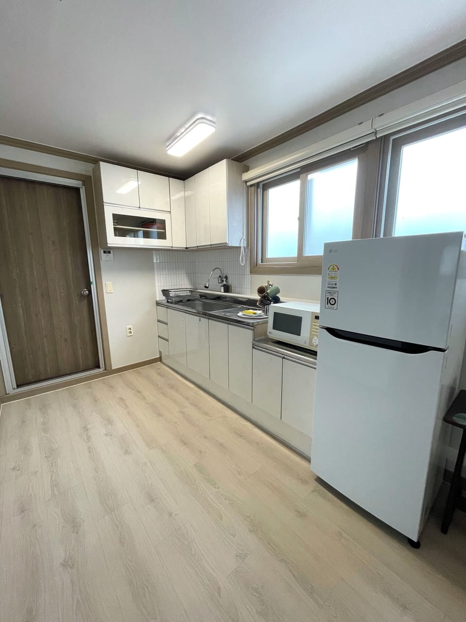 Shared fridge, microwave, cookware/dishes/utensils, freezer