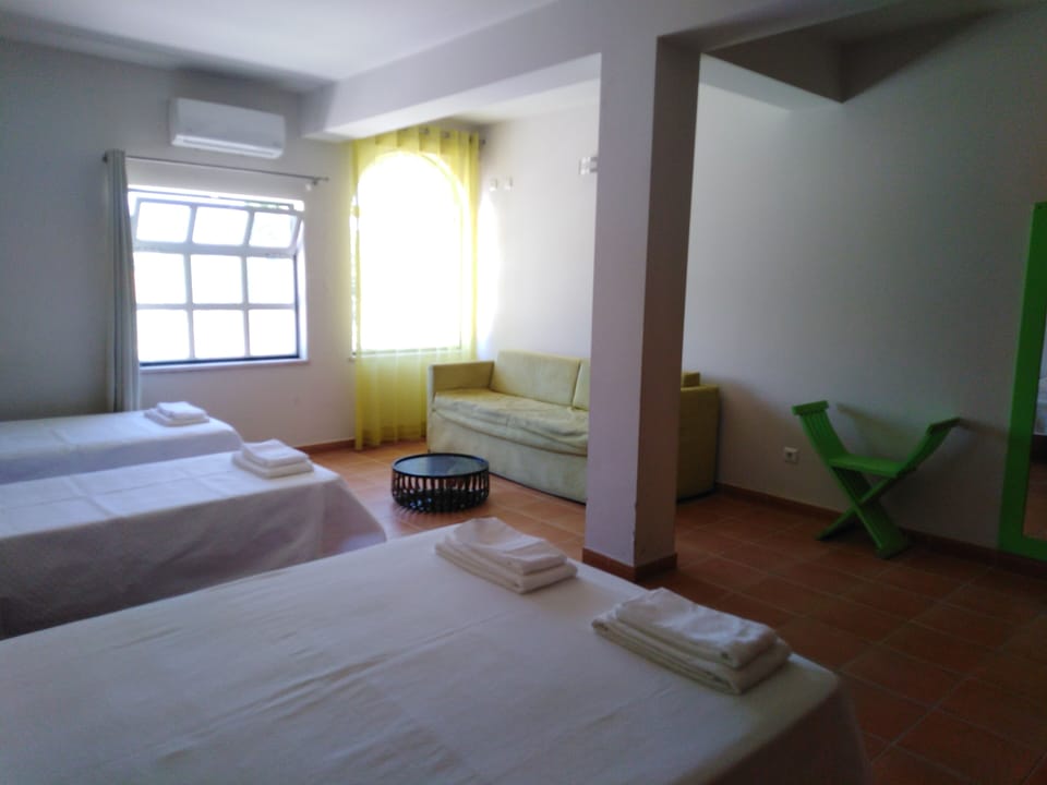 Family Quadruple Room | Blackout drapes, free WiFi, bed sheets