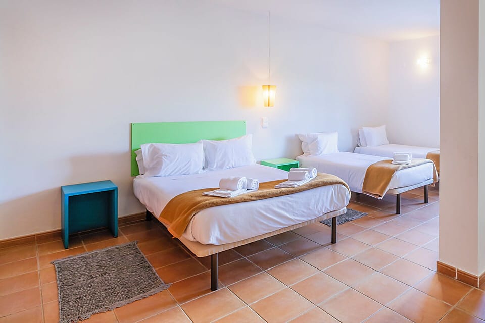 Family Quadruple Room | Blackout drapes, free WiFi, bed sheets