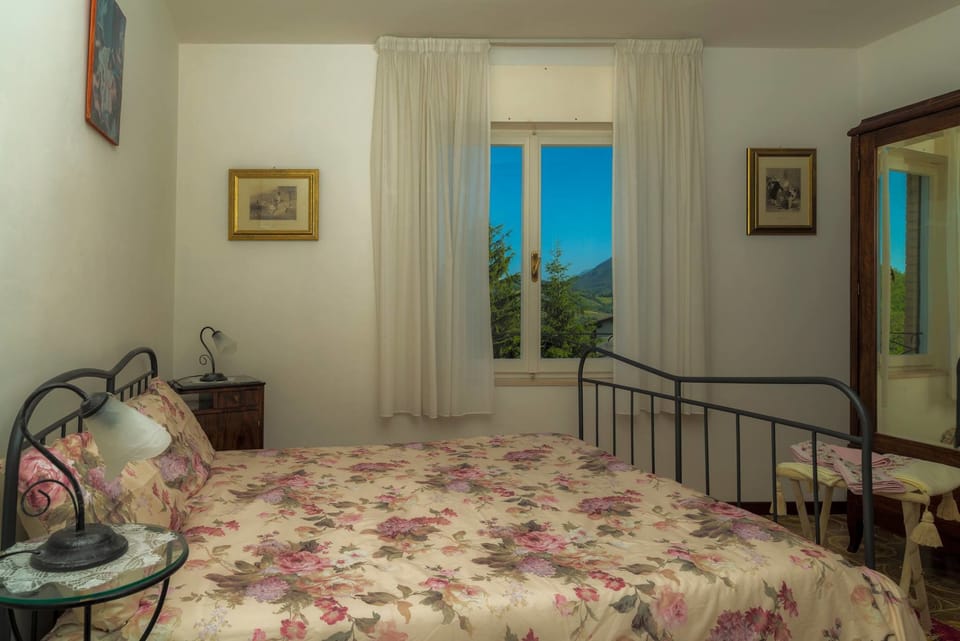 Standard Apartment, 1 Bedroom, Terrace, Partial Lake View (Lago) | 2 bedrooms, individually furnished, desk, iron/ironing board