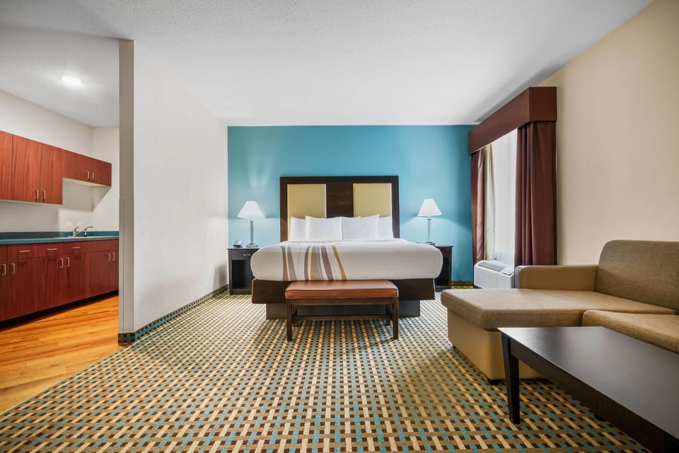 Suite, Multiple Beds (Various Views) | Pillowtop beds, desk, laptop workspace, iron/ironing board