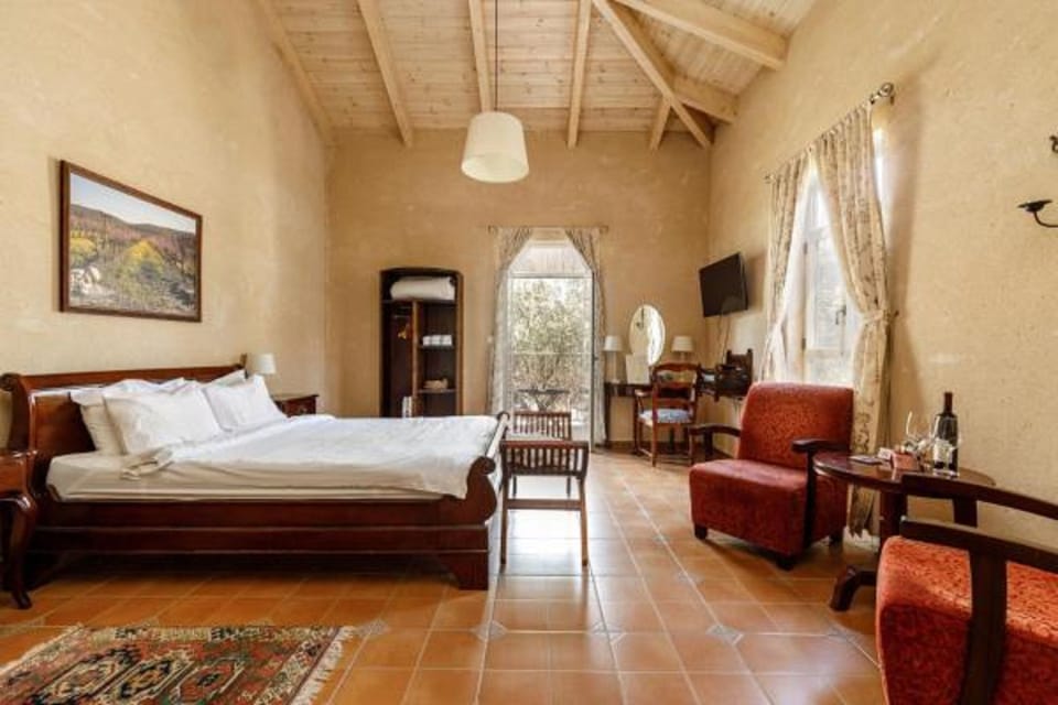 Suite, 1 Queen Bed, Non Smoking | Minibar, desk, iron/ironing board, free WiFi
