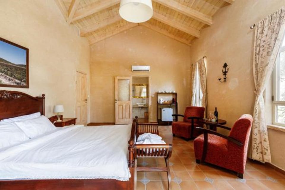 Suite, 1 Queen Bed, Non Smoking | Minibar, desk, iron/ironing board, free WiFi