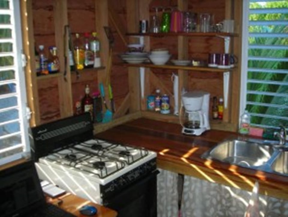 Cottage, Non Smoking | Private kitchen | Full-size fridge, microwave, oven, stovetop
