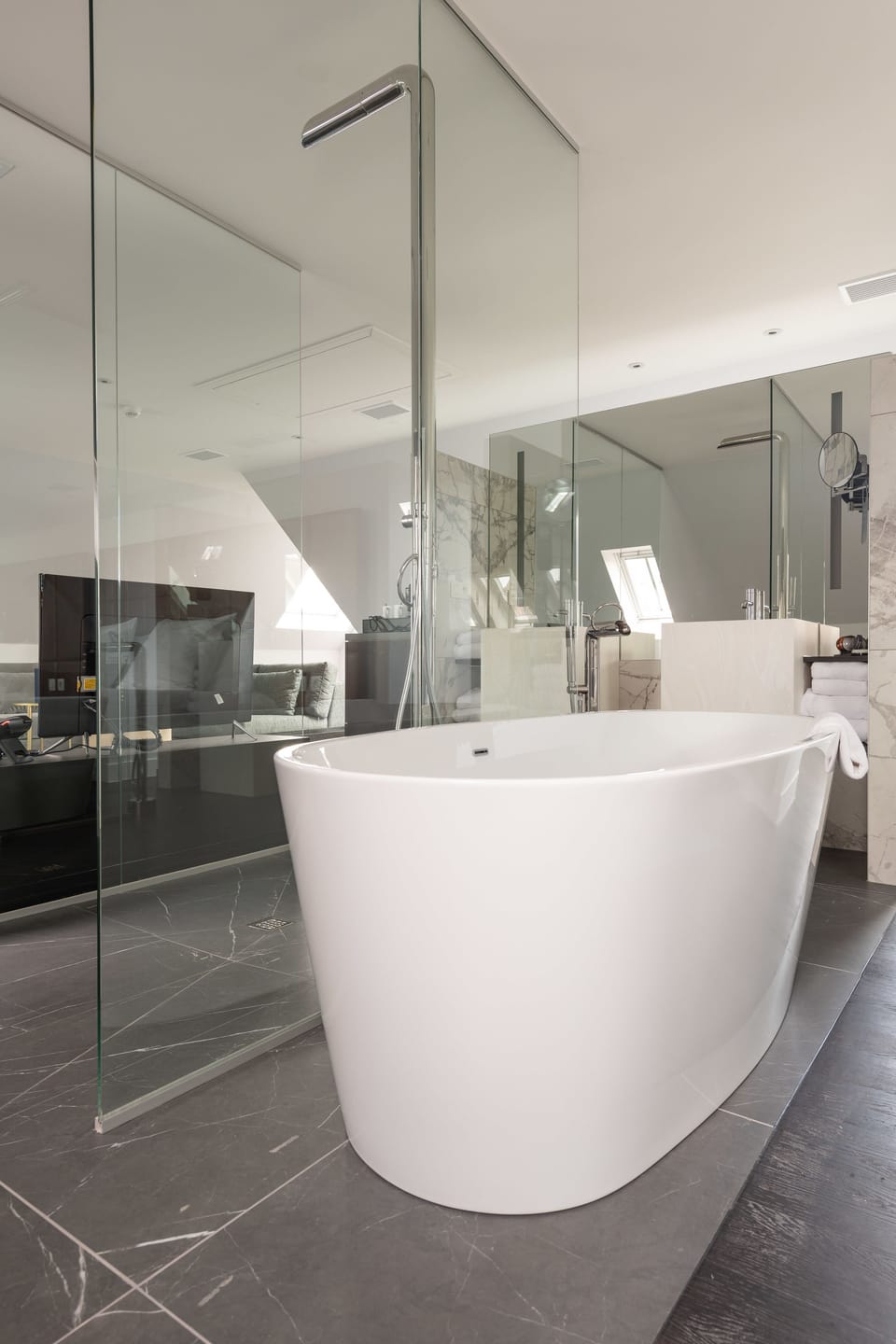 The Loft Suite | Bathroom | Rainfall showerhead, free toiletries, hair dryer, towels