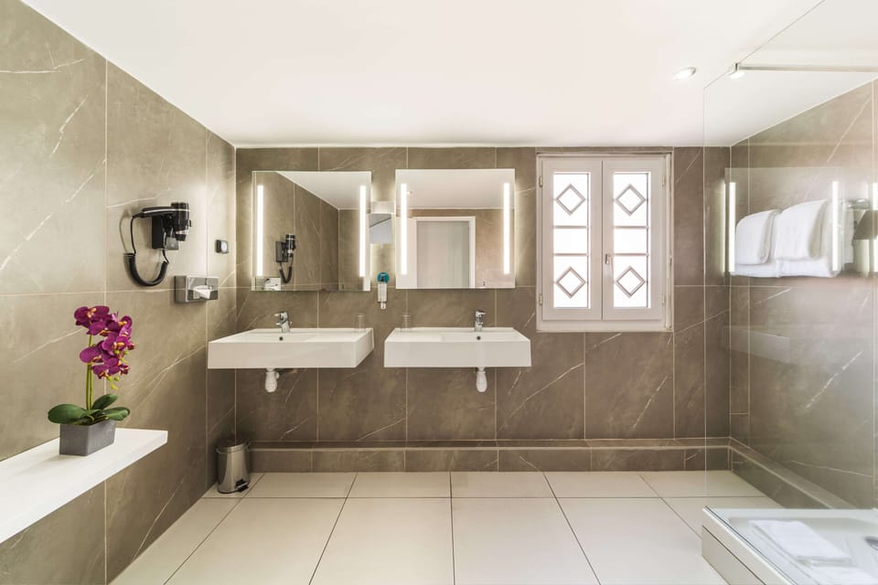 Suite, Balcony, Ocean View | Bathroom | Shower, eco-friendly toiletries, hair dryer, towels