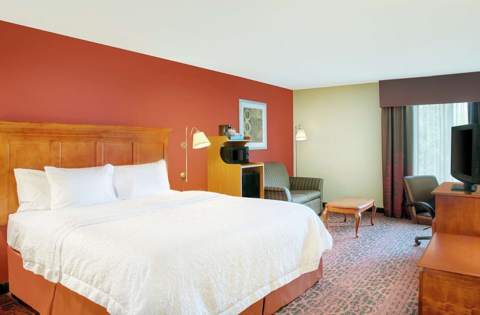 Premium bedding, blackout drapes, iron/ironing board, free WiFi