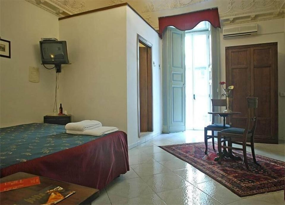 Minibar, laptop workspace, blackout drapes, iron/ironing board