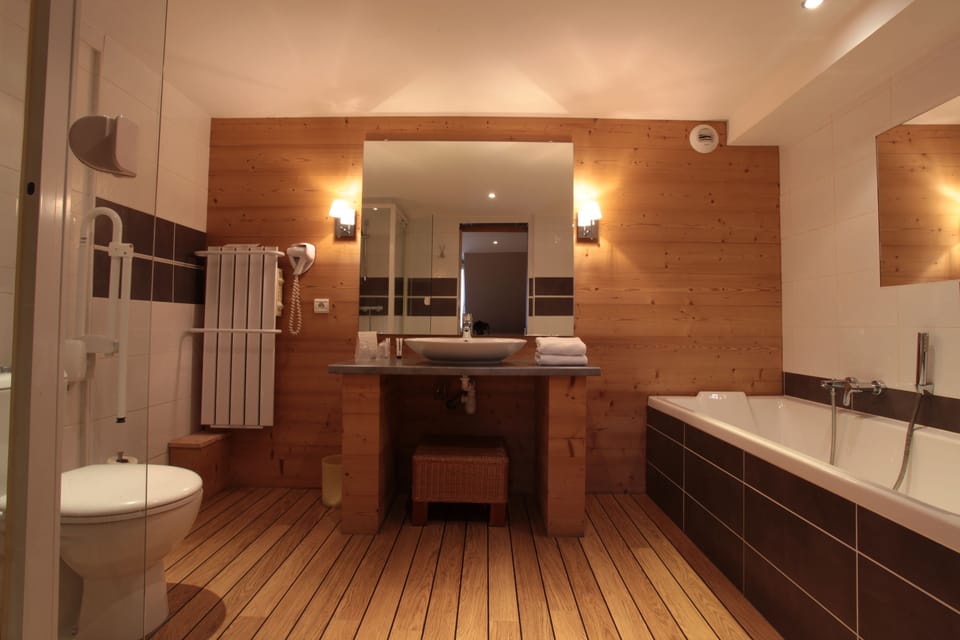 Deep soaking tub, rainfall showerhead, free toiletries, hair dryer