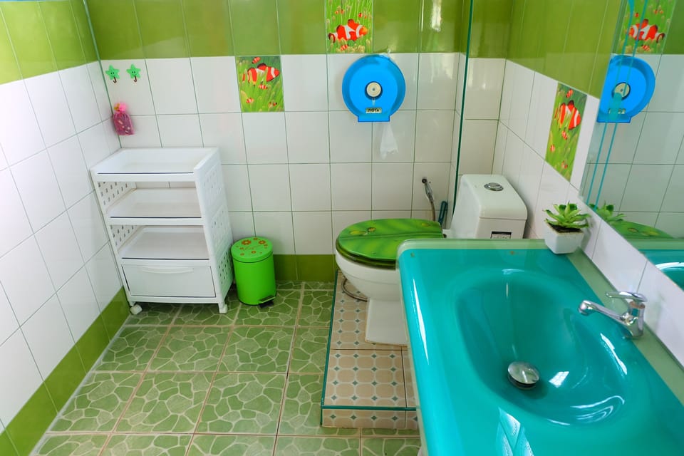 Family Room | Bathroom | Combined shower/tub, deep soaking tub, free toiletries, towels