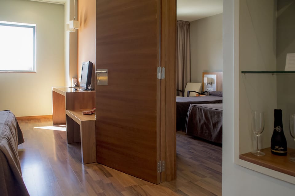 Premium bedding, desk, blackout drapes, soundproofing