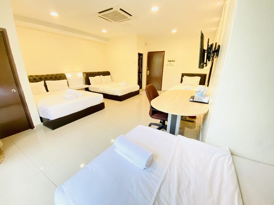 Family Suite, Multiple Beds, Non Smoking | Desk, soundproofing, iron/ironing board, free WiFi