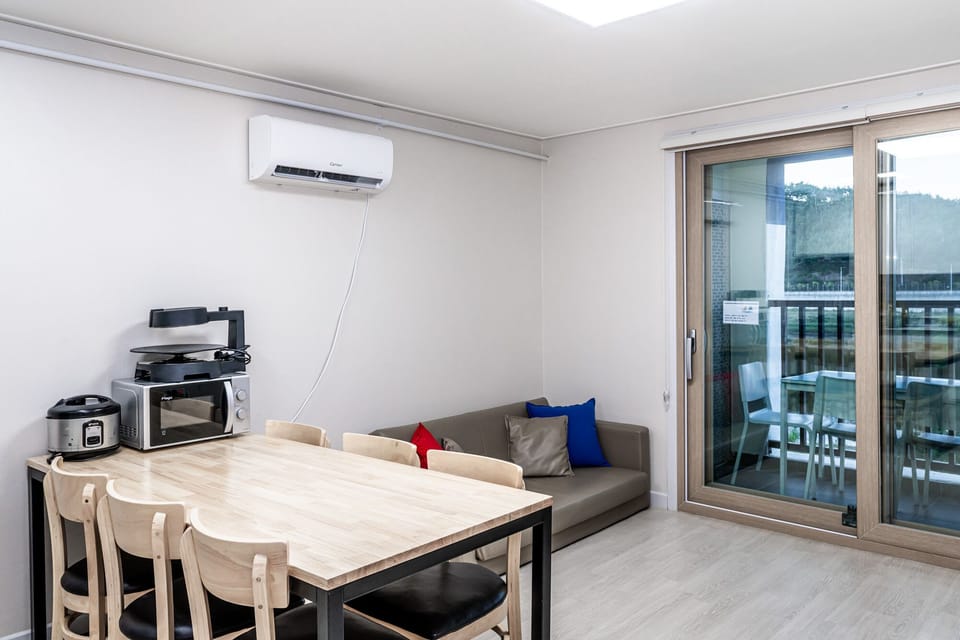 Premium Studio, 1 Bedroom | Living area | Flat-screen TV