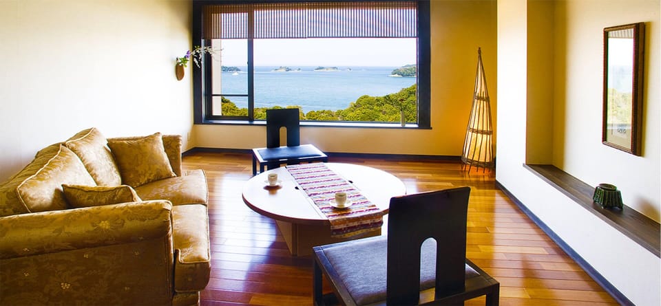 Japanese Western Style Suite, TOBISHIMAKAN, with Private Open-air Bath | Living area | LCD TV, table tennis