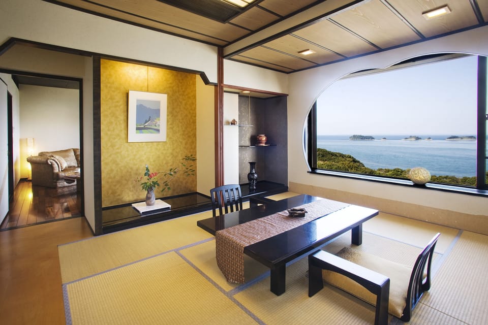 Japanese Western Style Suite, TOBISHIMAKAN, with Private Open-air Bath | Living room | LCD TV, table tennis