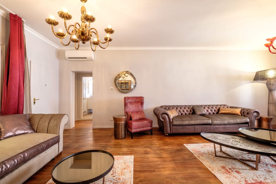 Luxury Apartment | Living area | Flat-screen TV